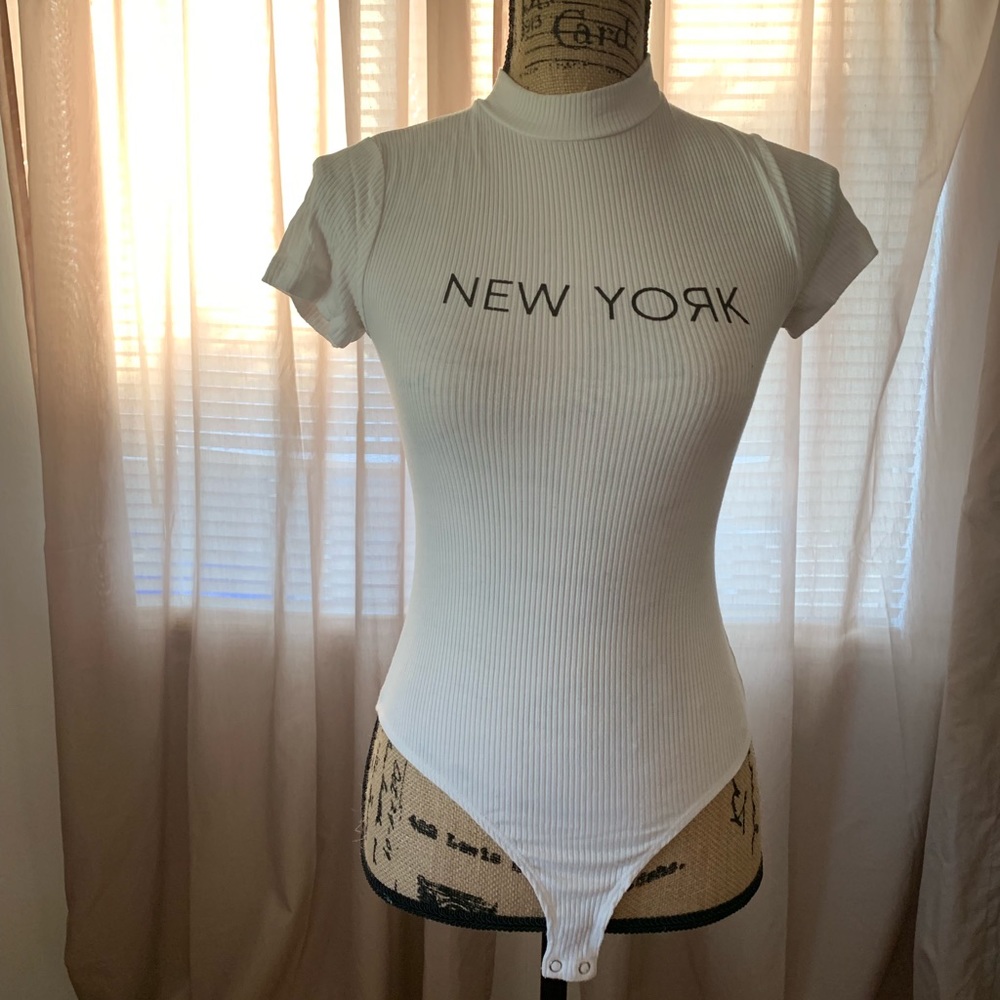 White Shortsleeved Bodysuit. Size small